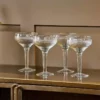 Nkuku Tableware Mila Champagne Glass - Clear (Set Of 4) 1 Nkuku Tableware Mila Champagne Glass - Clear (Set Of 4)