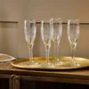 Nkuku Mila Tall Champagne Glass - Clear (Set Of 4) Tableware 1 Nkuku Mila Tall Champagne Glass - Clear (Set Of 4) Tableware