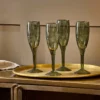 Nkuku Mila Tall Champagne Glass - Dark Emerald (Set Of 4) Tableware 1 Nkuku Mila Tall Champagne Glass - Dark Emerald (Set Of 4) Tableware