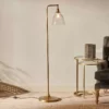 Nkuku Muturi Glass Floor Lamp - Antique Brass New Arrivals 1 Nkuku Muturi Glass Floor Lamp - Antique Brass New Arrivals