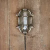 Nkuku Oshi Brass Oval Outdoor Bulkhead Light - Iron